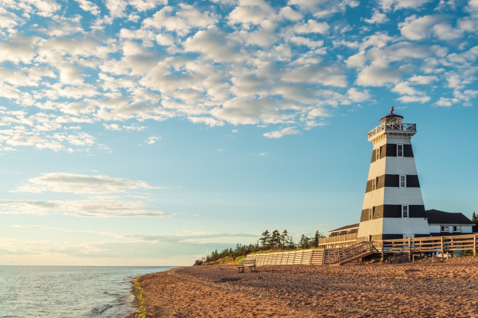 An image of a lighthouse in Cedar Dunes Provincial Park in Prince Edward Island, Canada.